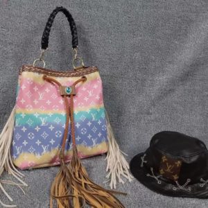L_V fringed handbag and cowboy hat